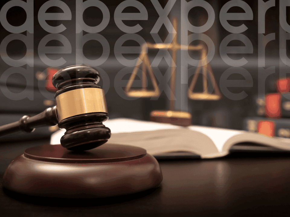 651bff5d2fa587f0355aba00_Judge-s-hammer-and-scales-on-the-table.png