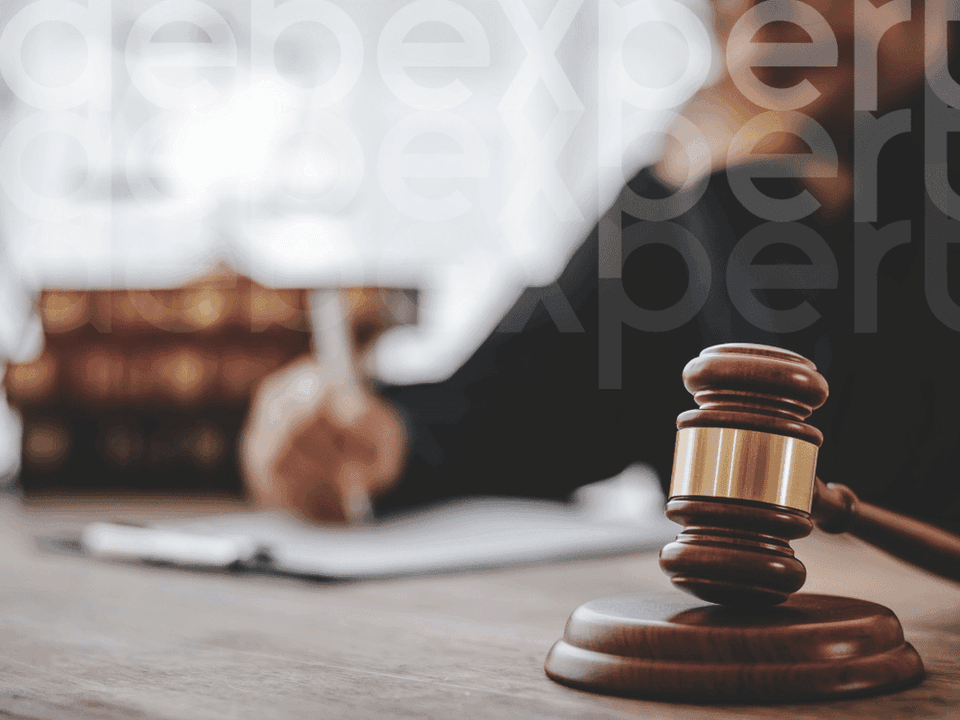 652787861c6176856823fc87_The-judge-s-gavel-on-the-table.png